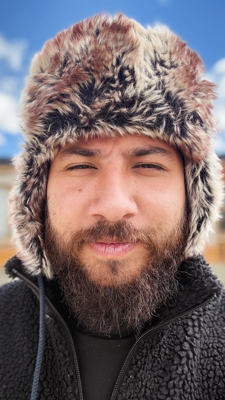 Kanwar Pal Singh wearing a winter hat outdoors